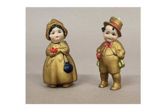 gold clothed dolls 