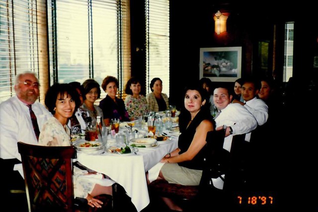 Marilyn Bello seated at head of table with Martha Garcia. Marilyn joined NHMLAC a year and four months before Martha, or as she likes to call her, "Martita."