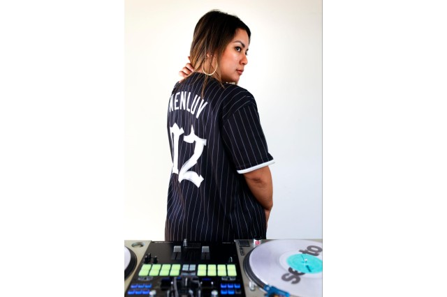 DJ Wenluv getting ready to spin records