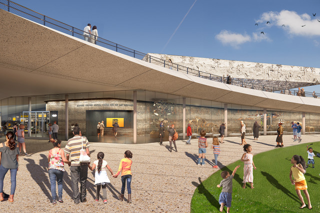Visitors on a green lawn and cream walkway, facing a glass-walled gallery, with a cream roof overhead