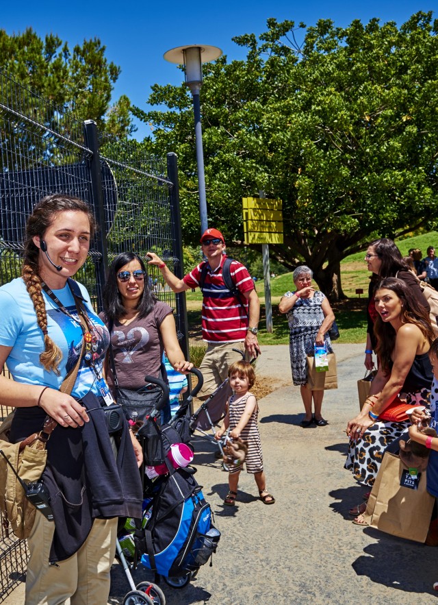 gallery interpreter with group tour outdoors at the Tar Pits