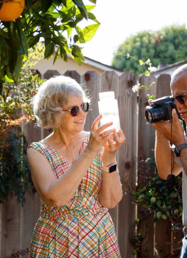 Kathy and John Dean in backyard