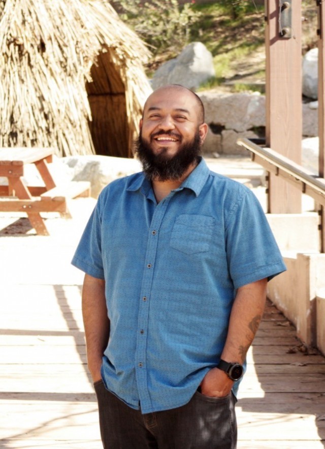 Marcos Trinidad stands at the Audubon Center at Debs Park