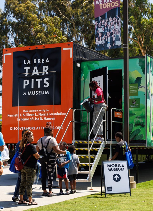 Crowds wait for entrance in the new Tar Pits Mobile Museum