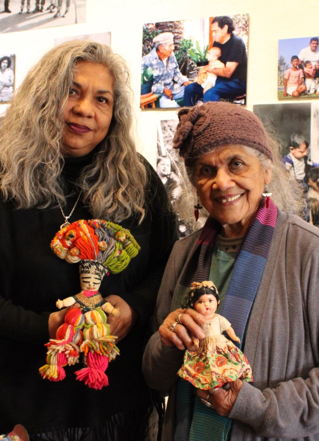 Rosanna and Ofelia Esparza with dolls