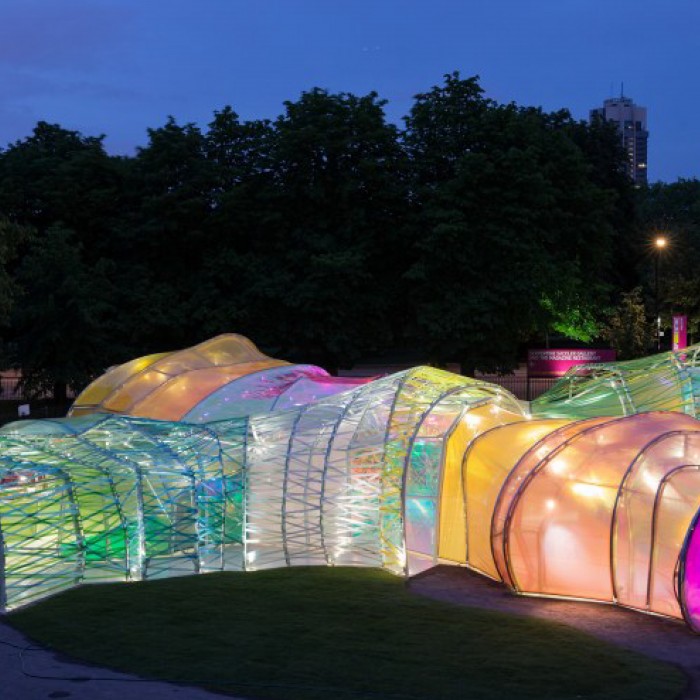 serpentine pavilion lit up at night