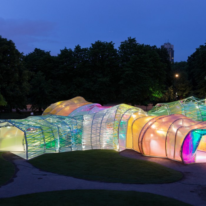serpentine pavilion lit up at night