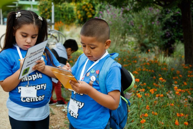 Kids doing a survey in the Nature Gardens. 
