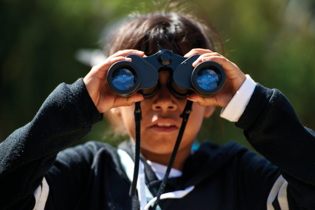 City Nature Challenge girl with binoculars