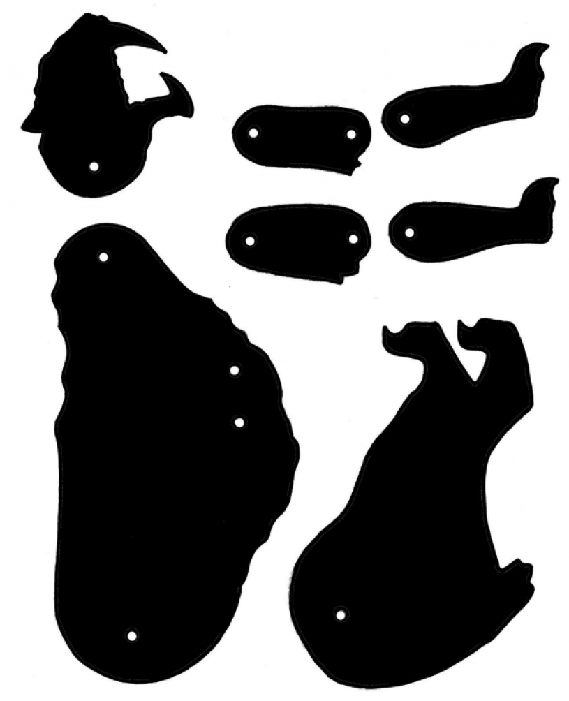 Saber-toothed cat shadow puppet template pieces including skull, body, and limbs. 